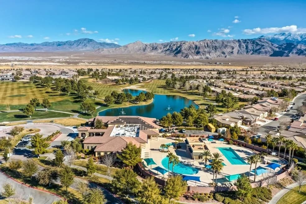 Large community resort-style pool and lake overlooking the mountains
