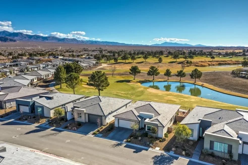 Modern homes located directly on the golf course with water features